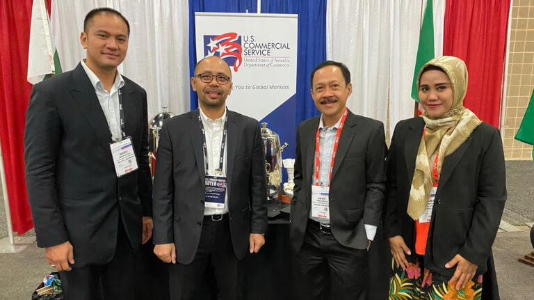 Four representatives at the DistribuTECH International 